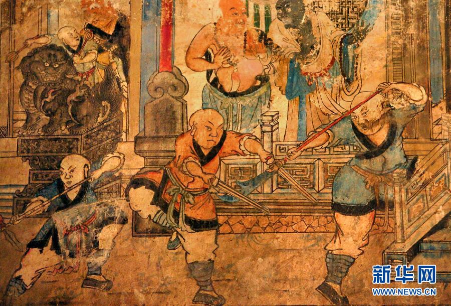 少林寺白衣殿內的墻上表現(xiàn)少林武僧習武練拳的壁畫(局部,2005年9月15日攝)。