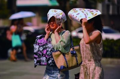 進入7月份以來，南京出現(xiàn)了多個高溫天氣。本報資料圖片 劉瀏 攝