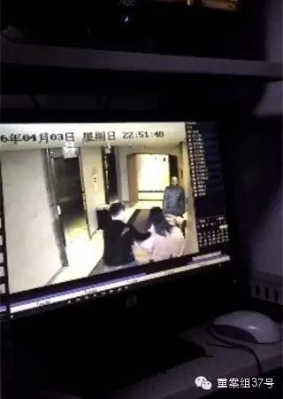 一女子在酒店被陌生男子拖拽。    視頻截圖